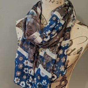 Blue and gray floral patterned scarf.